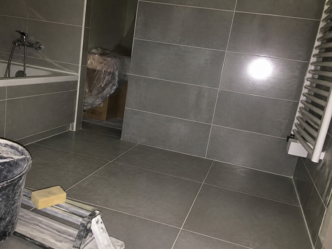 Tile laying before photographic enhancement