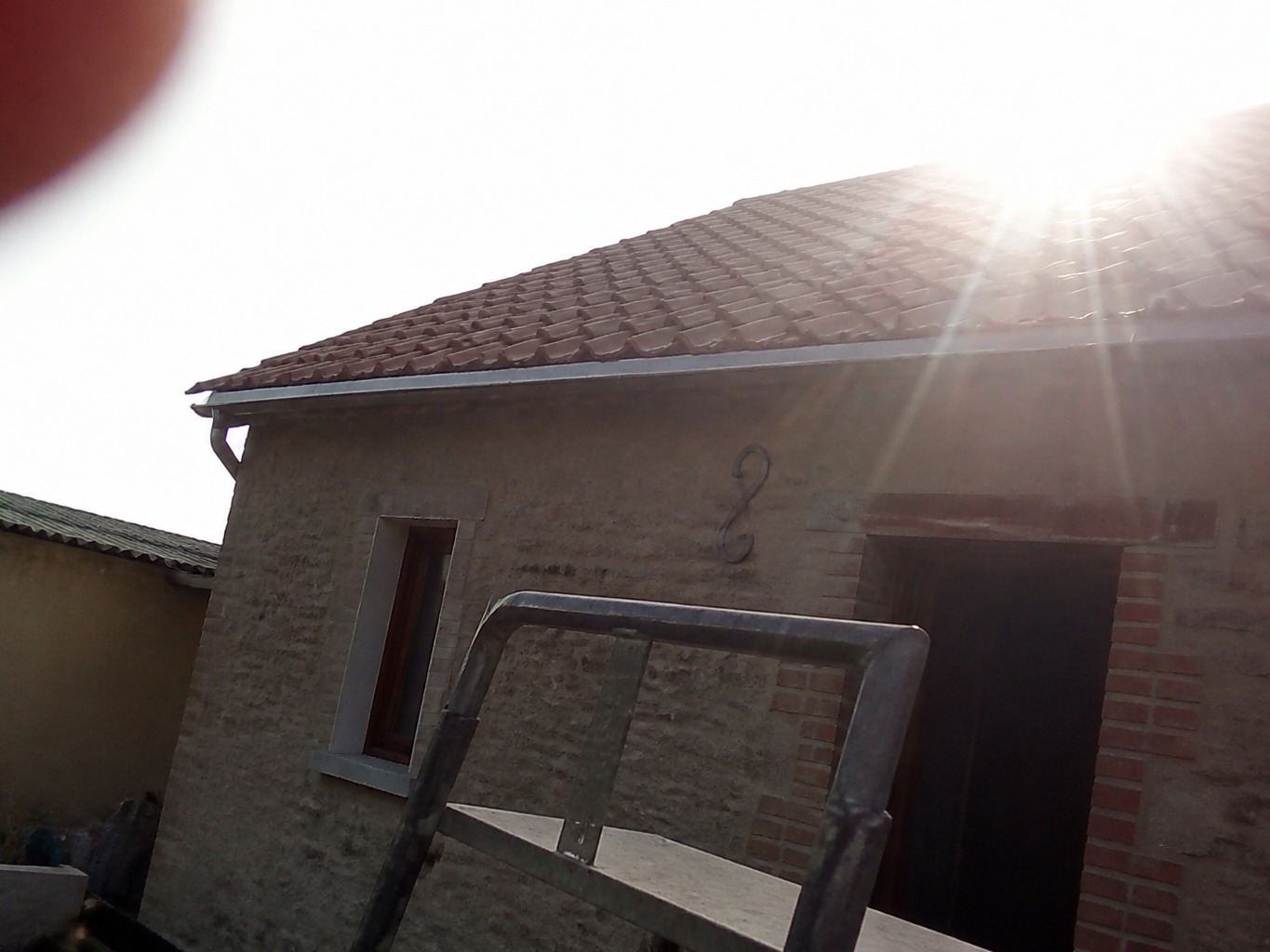 Roof renovation before photographic enhancement
